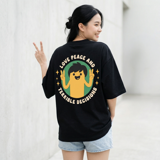 Woman wearing black oversized t-shirt with funny love peace terrible decisions back print